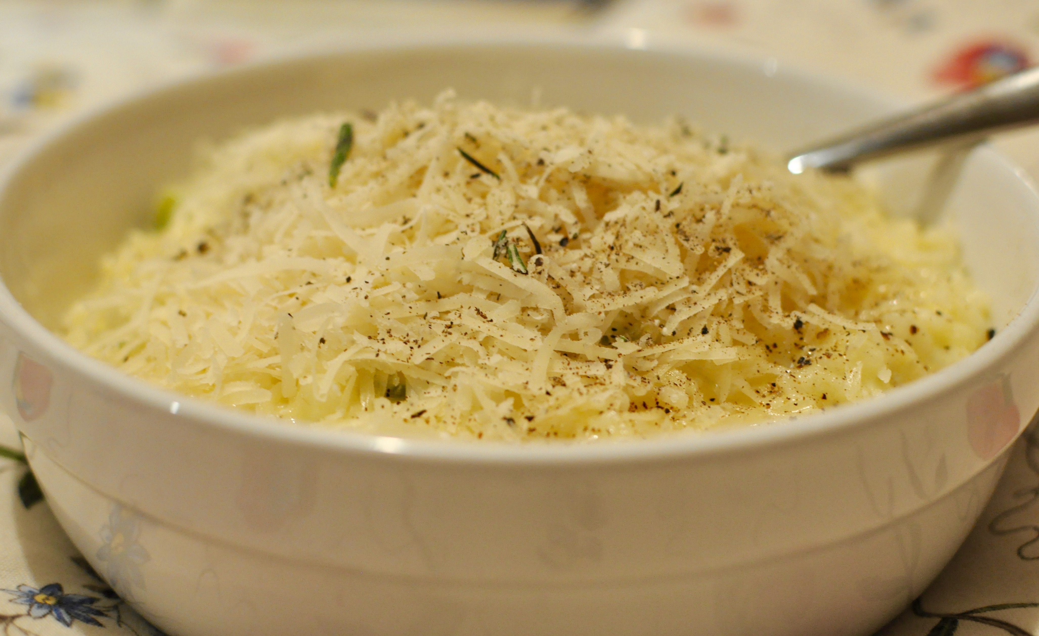 Bowl of lemon risotto in bed.
